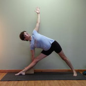 Rebecca Wood practicing a supported triangle pose at Palm Yoga